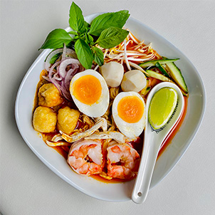 laksa-house.ch | Laksa Chicken, tofu, egg and fish balls